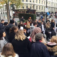 Court reporter talks to Law students outside Old Bailey